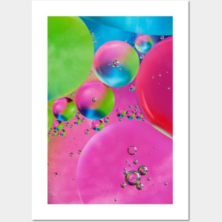 Colorful close up of oil drops in water Posters and Art